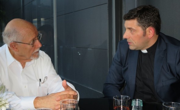 Rabbi Bemporad (L) discusses minority religions in Kosovo with Fr. Kastriot Idrizi during a recent visit.